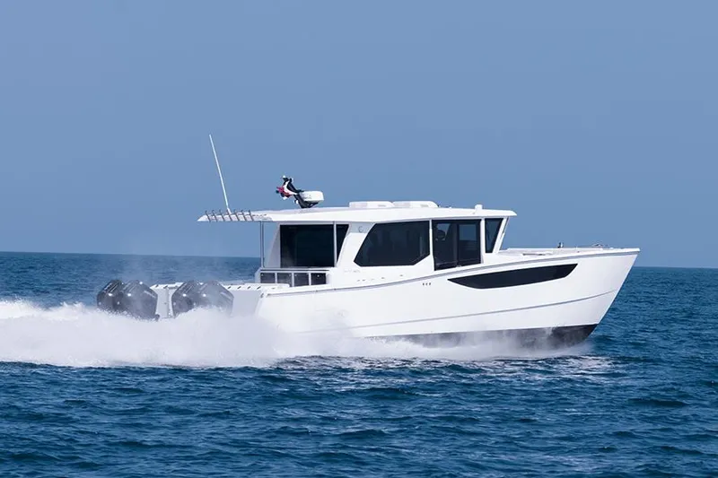 Slide: The Image of 2026 SilverCAT 46WA boat cruising on open water, showcasing sleek design and powerful engines. - 0