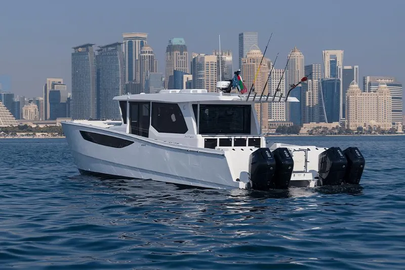 Slide: The Image of SilverCAT 46WA 2026 boat on water with city skyline in background. - 8