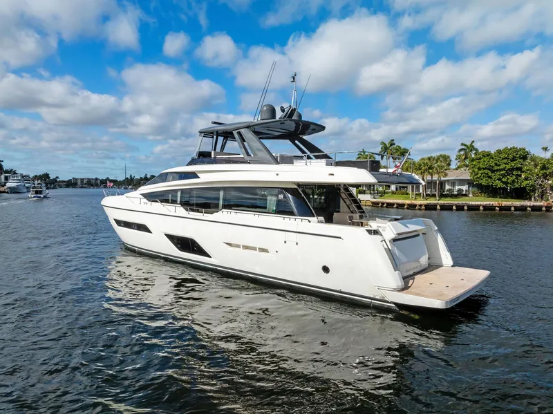 Slide: The Image of 2019 Ferretti Yachts 780 cruising on a sunny day, showcasing sleek design and luxury. - 12