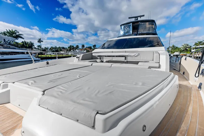 Slide: The Image of 2019 Ferretti Yachts 780 with spacious deck under a clear blue sky. - 21