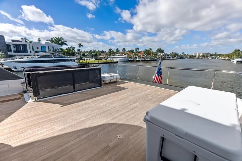Slide: The Image of Ferretti Yachts 780, 2019 model, spacious deck with scenic waterfront view. - 25