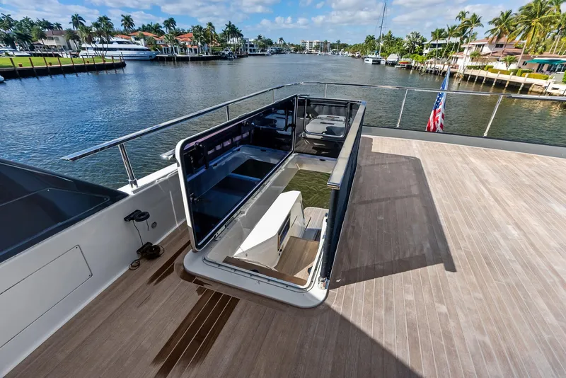 Slide: The Image of 2019 Ferretti Yachts 780, spacious deck with scenic waterfront view. - 26