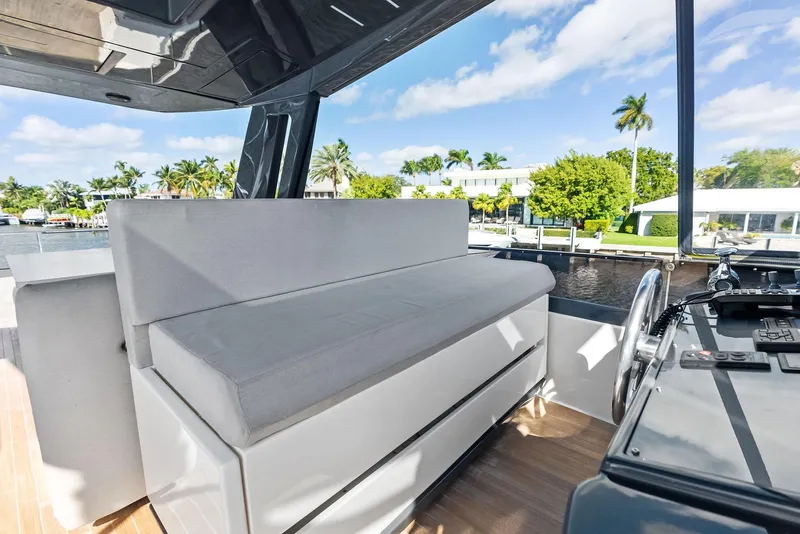 Slide: The Image of Luxury seating area on 2019 Ferretti Yachts 780, with scenic waterfront view. - 30