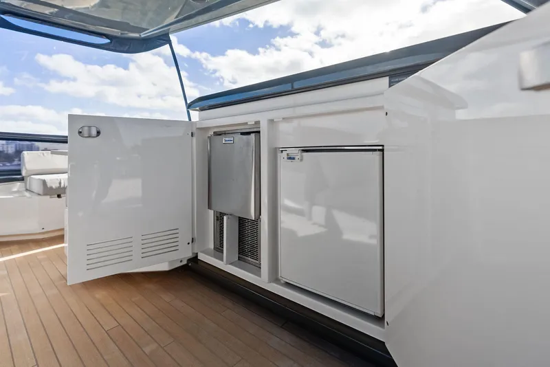Slide: The Image of Outdoor kitchen area on 2019 Ferretti Yachts 780, featuring sleek cabinetry and appliances. - 33
