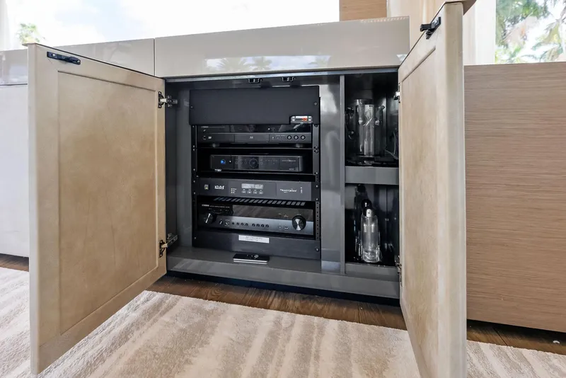 Slide: The Image of Open cabinet with audio equipment on a 2019 Ferretti Yachts 780. - 35