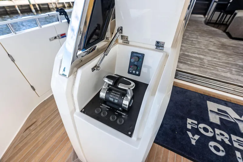 Slide: The Image of Control panel of a 2019 Ferretti Yachts 780, featuring sleek design and modern technology. - 36