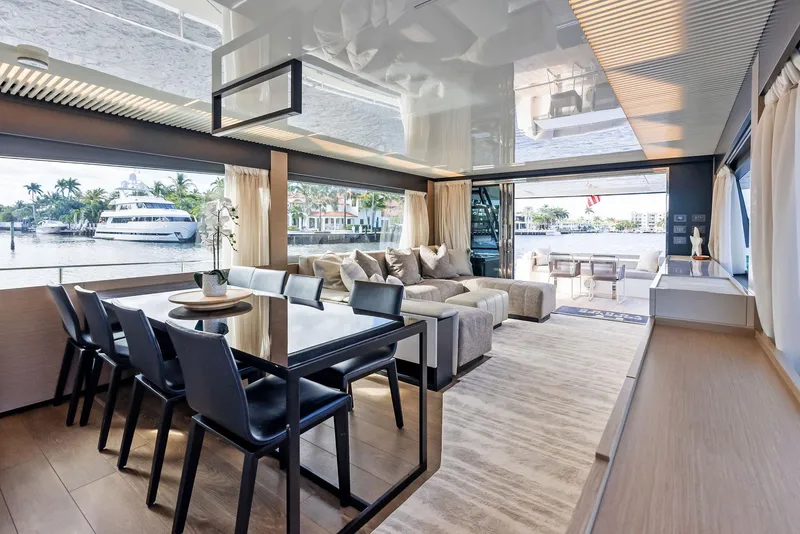 Slide: The Image of Luxurious interior of 2019 Ferretti Yachts 780 with elegant dining and seating area. - 43