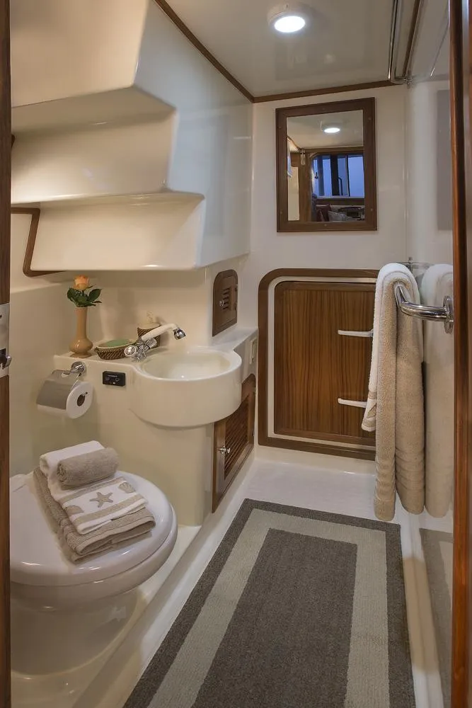 Slide: The Image of 2026 Helmsman Trawlers 38E Pilothouse bathroom with modern fixtures and elegant design. - 31
