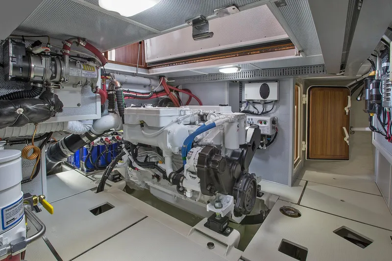 Slide: The Image of Engine room of 2026 Helmsman Trawlers 38E Pilothouse, showcasing modern equipment and design. - 35
