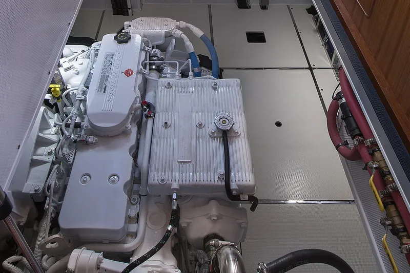 Slide: The Image of Engine room of 2026 Helmsman Trawlers 38E Pilothouse, showcasing a clean, organized layout. - 36