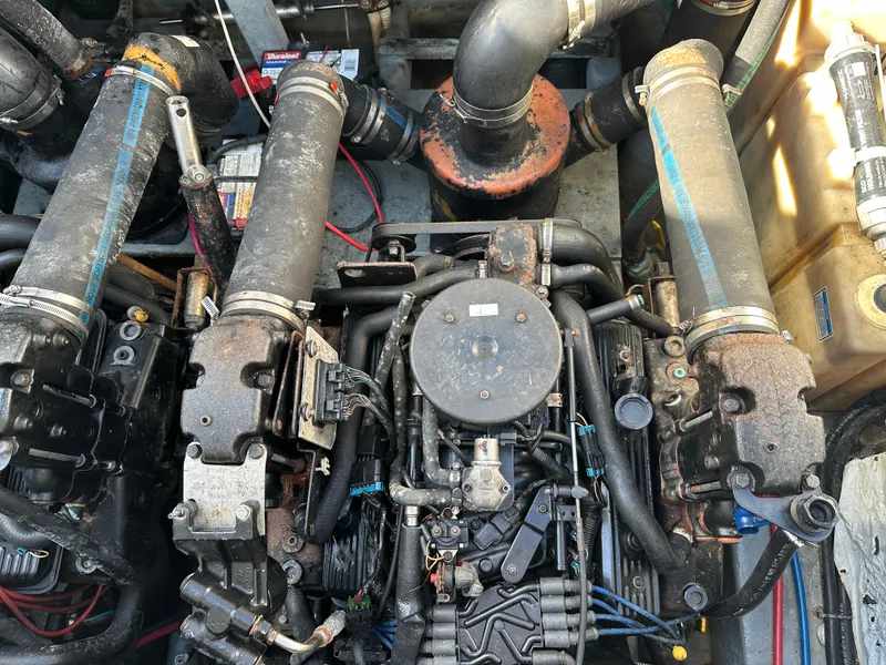 Slide: The Image of Engine compartment of a 2002 Sea Ray 340 Sundancer boat. - 14