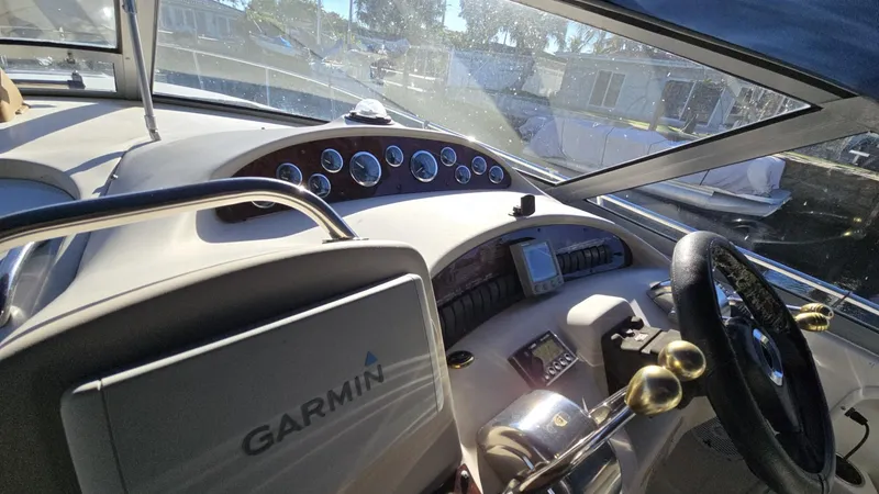 Slide: The Image of Cockpit of 2002 Sea Ray 340 Sundancer with Garmin navigation system. - 5