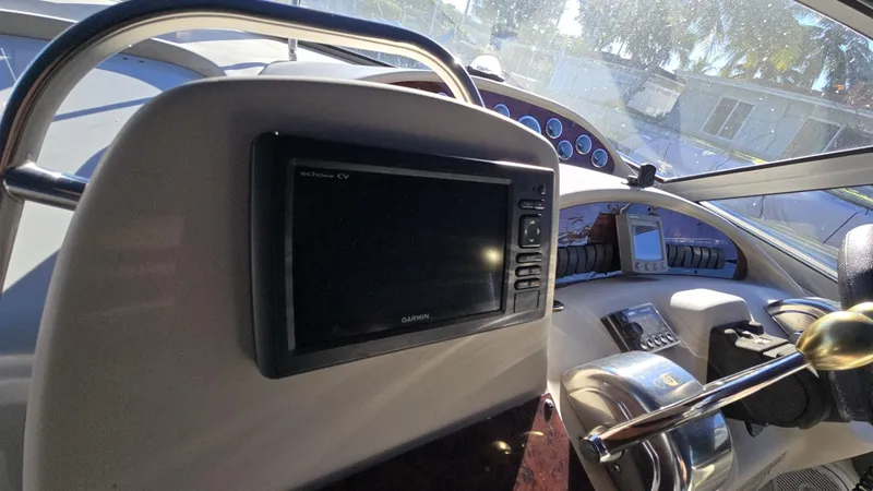 Slide: The Image of Interior helm of 2002 Sea Ray 340 Sundancer with Garmin navigation system. - 6