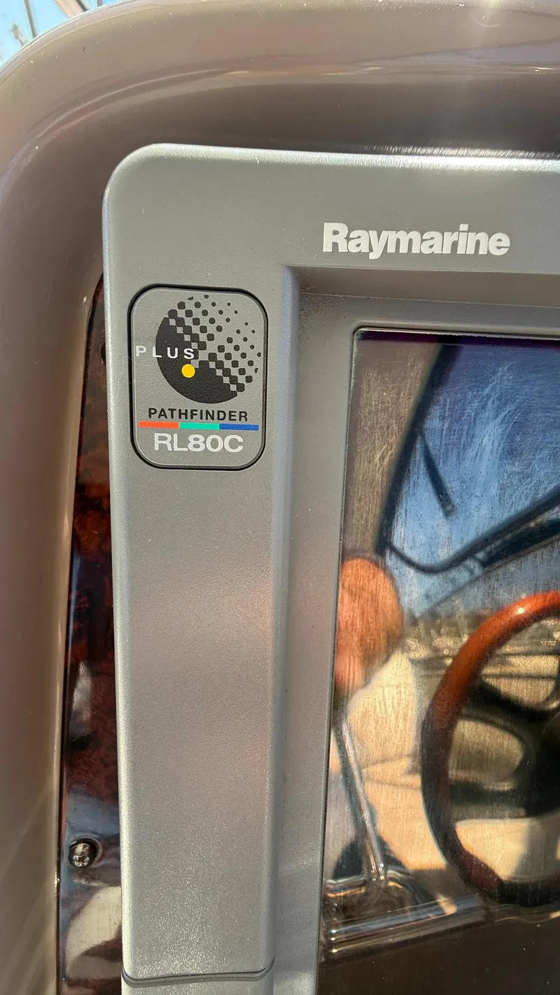 Slide: The Image of Raymarine Pathfinder RL80C on 2003 Regal Commodore 4260 boat dashboard. - 10