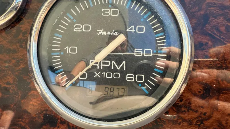 Slide: The Image of Close-up of a Faria RPM gauge on a 2003 Regal Commodore 4260 boat. - 21