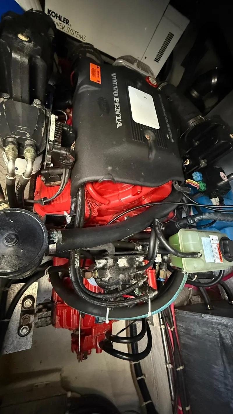 Slide: The Image of Engine of 2003 Regal Commodore 4260 boat, featuring Volvo Penta components. - 25