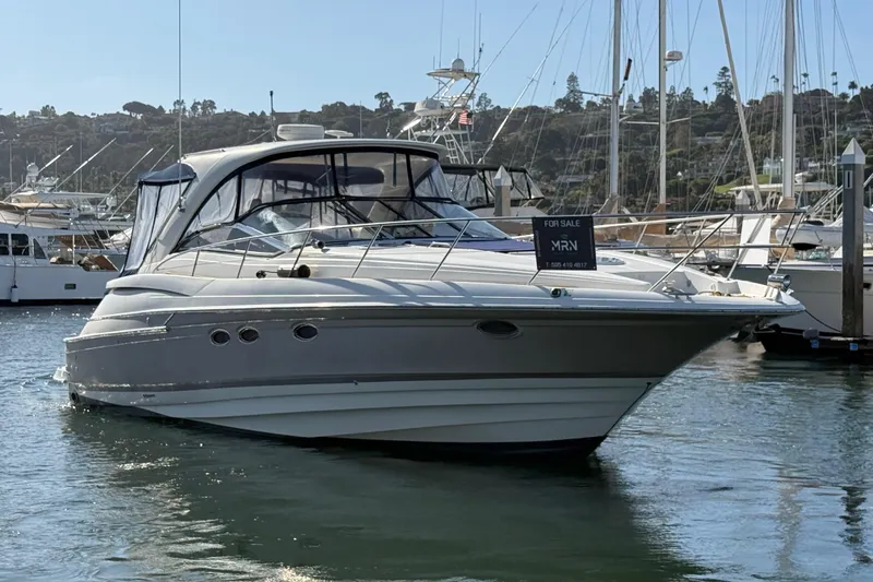 Slide: The Image of 2003 Regal Commodore 4260 yacht for sale, docked in marina, sunny day. - 29
