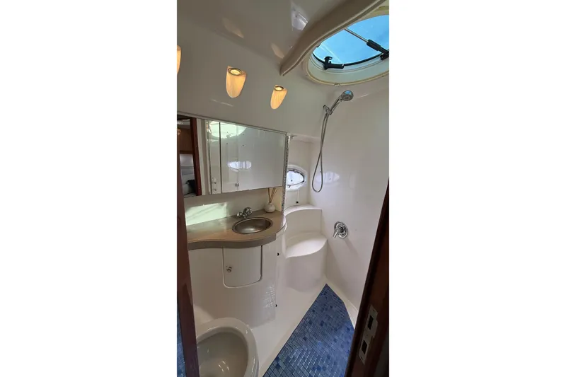 Slide: The Image of Bathroom interior of 2003 Regal Commodore 4260 yacht with shower and sink. - 41