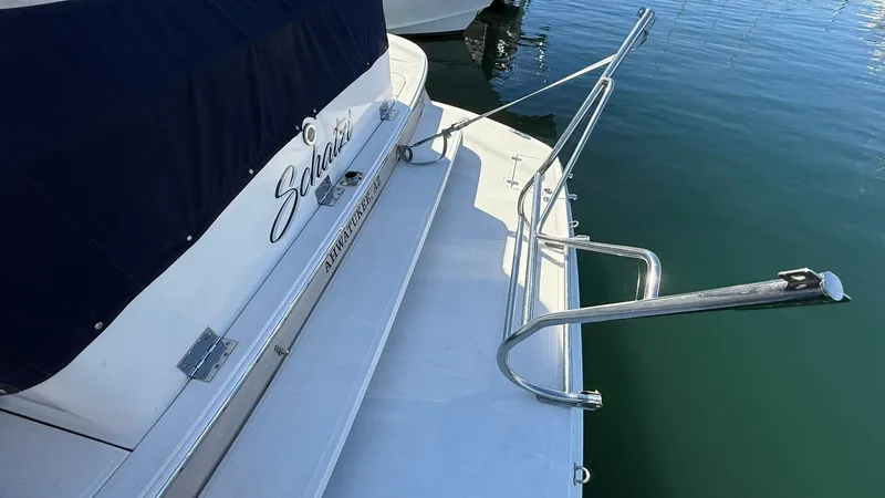 Slide: The Image of 2003 Regal Commodore 4260 yacht with swim platform and stainless steel ladder. - 8