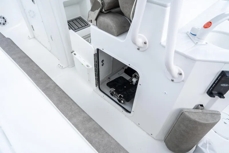 Slide: The Image of 2025 Sea Hunt Ultra 245 SE boat interior storage compartment. - 18