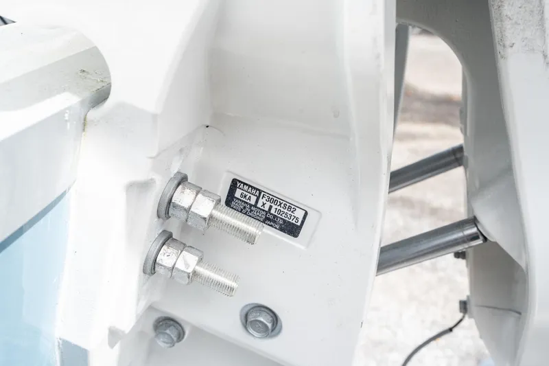 Slide: The Image of Close-up of 2025 Sea Hunt Ultra 245 SE boat engine mount bolts. - 38