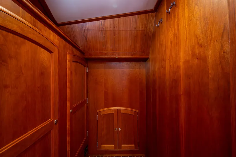 Slide: The Image of Luxurious wooden interior of 2021 Hinckley Talaria 43 Motoryacht cabin. - 20