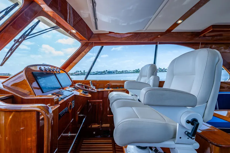 Slide: The Image of Interior of 2021 Hinckley Talaria 43 Motoryacht with luxurious helm and seating. - 5