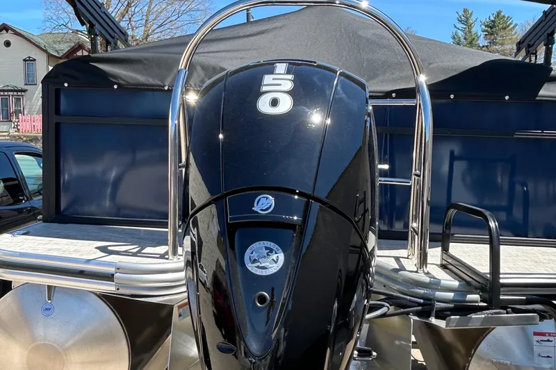 Slide: The Image of 2025 Lowe LS210WT boat with sleek design and reflective surface. - 6