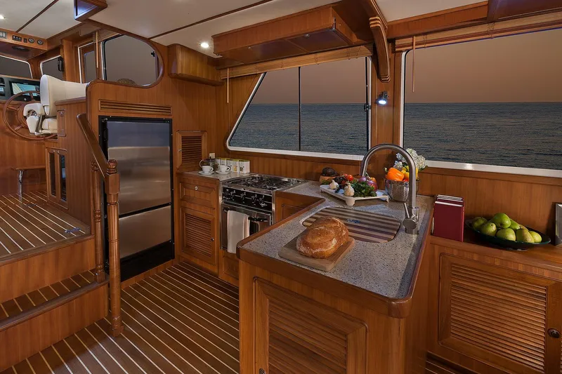 Slide: The Image of Luxurious kitchen interior of 2026 Helmsman Trawlers 43E PILOTHOUSE with ocean view. - 22