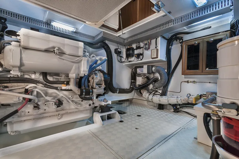 Slide: The Image of Engine room of 2026 Helmsman Trawlers 43E Pilothouse, showcasing advanced marine equipment. - 41