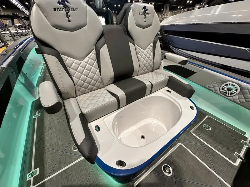 Slide: The Image of 2025 Statement 350 Open Center Console boat interior with luxury seating and modern design. - 13