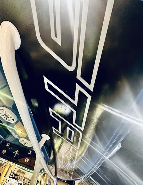 Slide: The Image of 2025 Statement 350 Open Center Console boat interior with sleek design and modern features. - 16