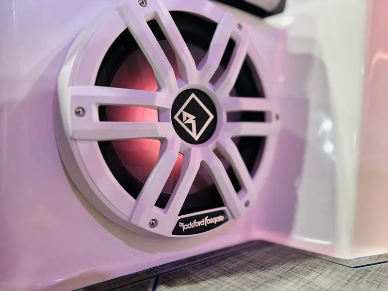 Slide: The Image of Close-up of Rockford Fosgate speaker on 2025 Statement 350 Open Center Console. - 18