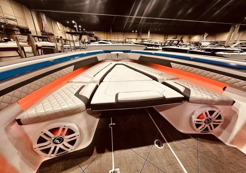 Slide: The Image of 2025 Statement 350 Open Center Console boat interior with modern seating and speaker system. - 19