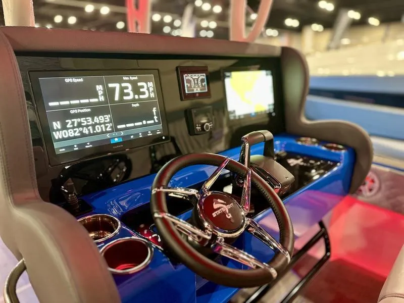 Slide: The Image of 2025 Statement 350 Open Center Console dashboard with digital displays and steering wheel. - 5