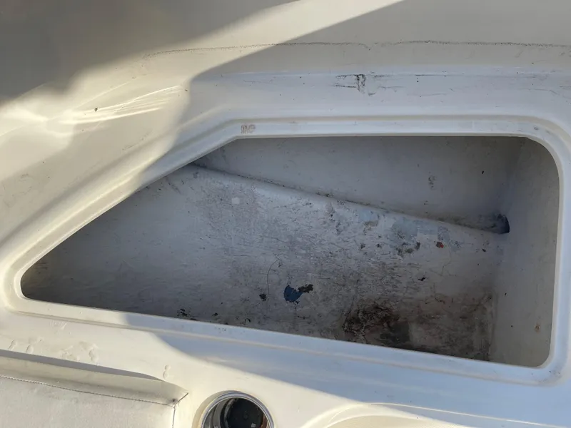 Slide: The Image of Storage compartment of a 2017 Bayliner Element E16 boat, showing interior details. - 26