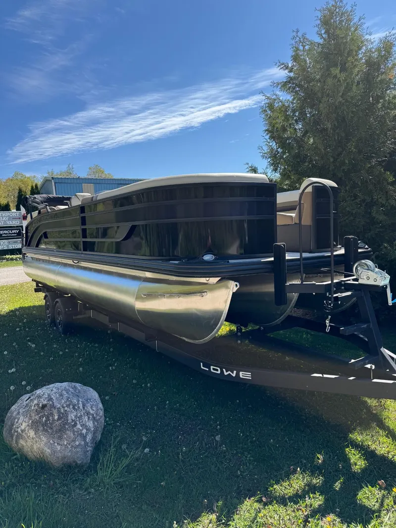 The Image of 2025 Lowe SS250WT pontoon boat with optional features, sleek design, and comfortable seating. - 0
