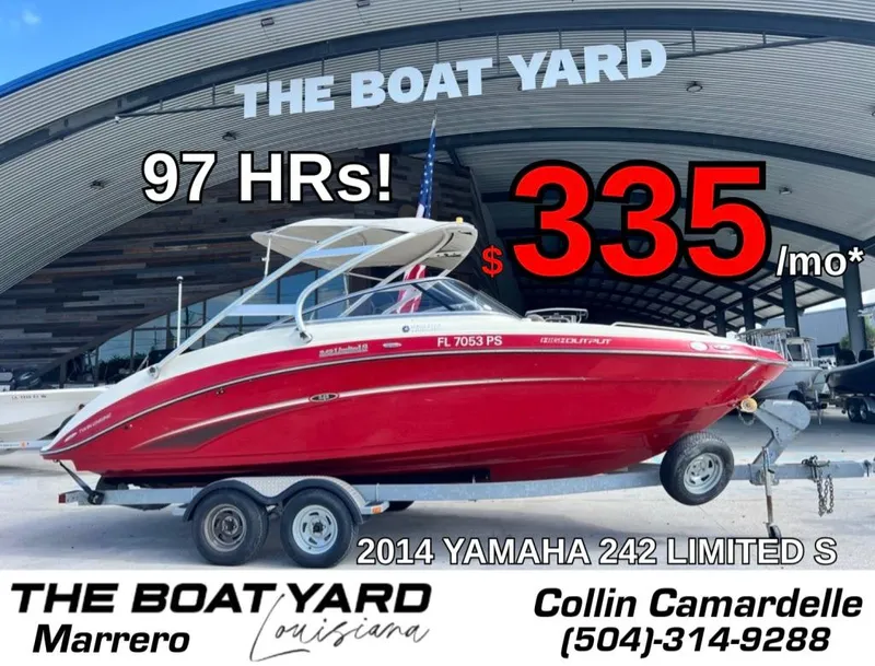 Slide: The Image of 2014 Yamaha 242 Limited S boat in red, available for $335/month at The Boat Yard. - 1