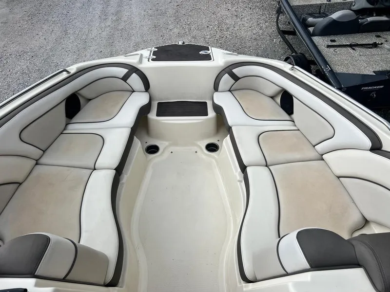 Slide: The Image of 2014 Yamaha Boats 242 Limited S interior with spacious seating and sleek design. - 12