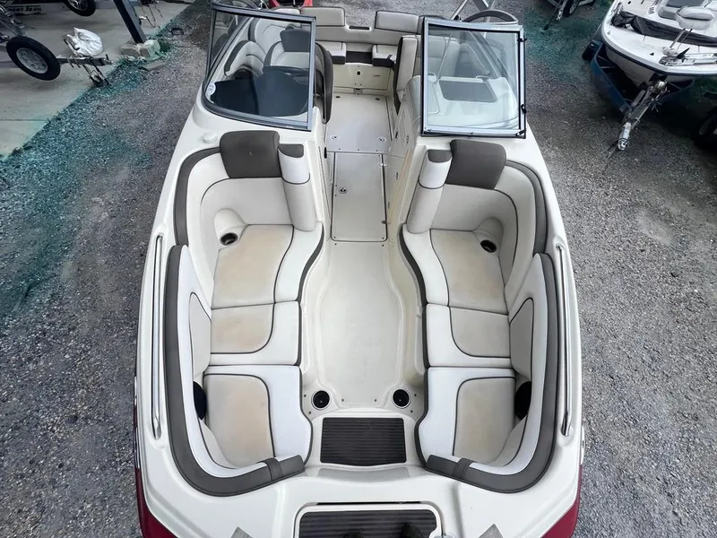 Slide: The Image of 2014 Yamaha Boats 242 Limited S interior, featuring spacious seating and sleek design. - 13