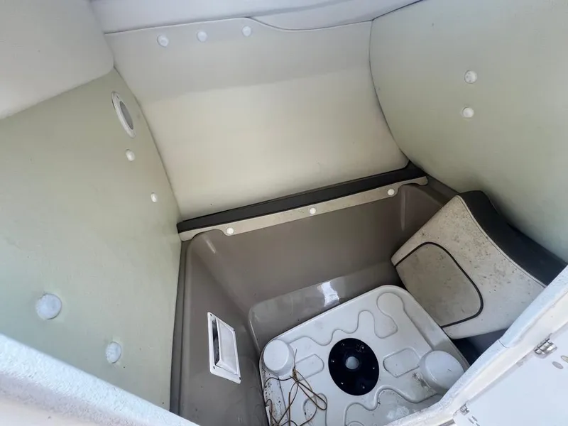Slide: The Image of Storage compartment of a 2014 Yamaha Boats 242 Limited S, featuring interior details. - 19