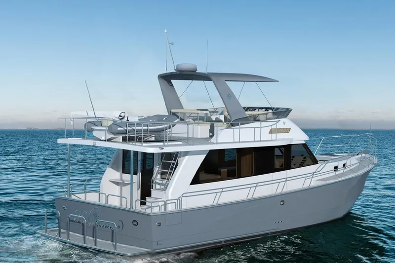 Slide: The Image of 2026 Helmsman Trawlers 43 Sedan yacht cruising on open water. - 4