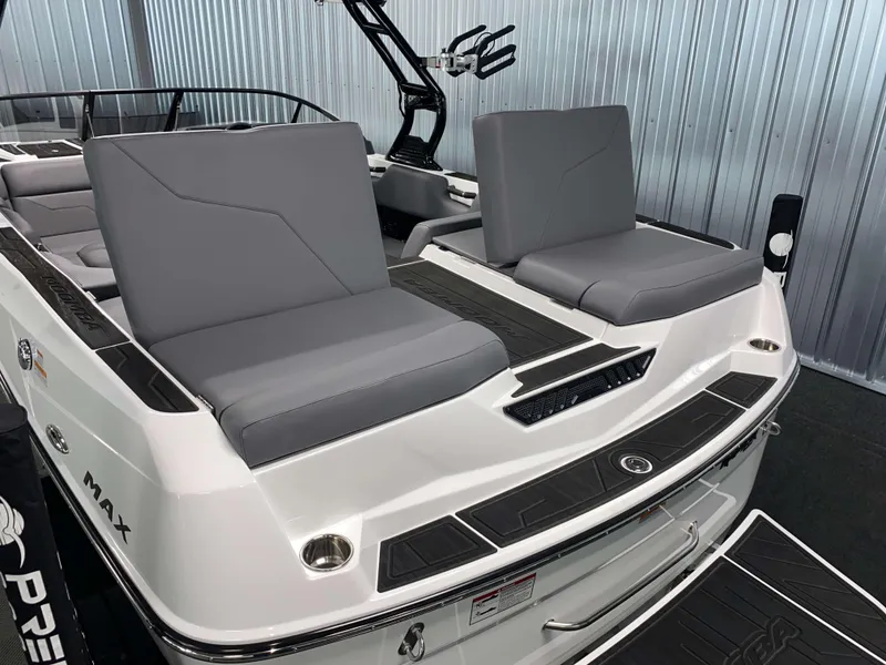 Slide: The Image of 2025 Moomba Max boat with gray seating and sleek design. - 4