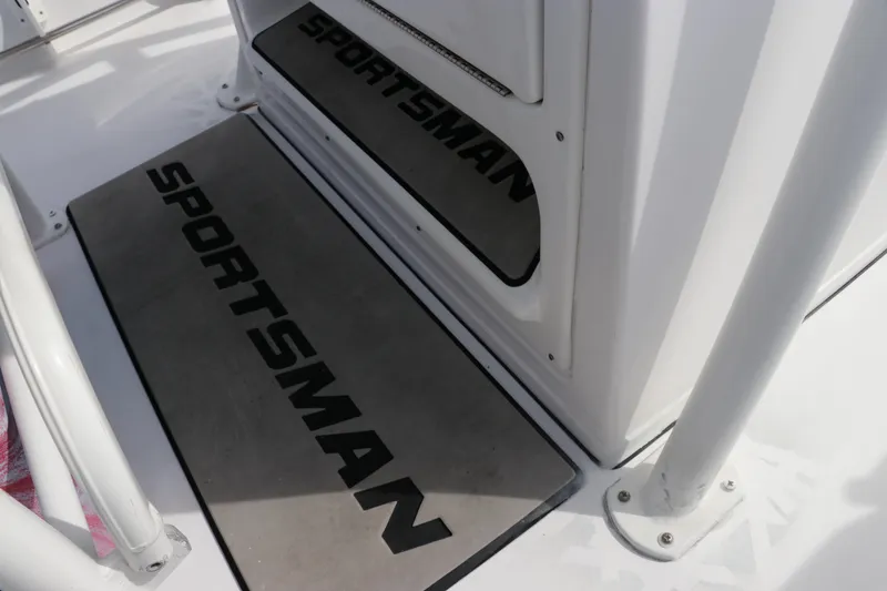 Slide: The Image of 2019 Sportsman Heritage 231 Center Console boat interior with branded mats. - 18