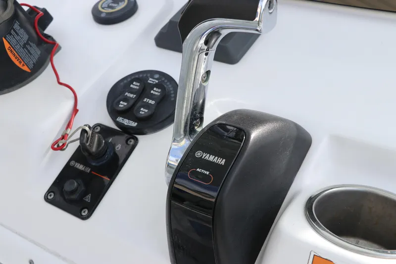 Slide: The Image of 2019 Sportsman Heritage 231 Center Console boat controls with Yamaha throttle. - 22