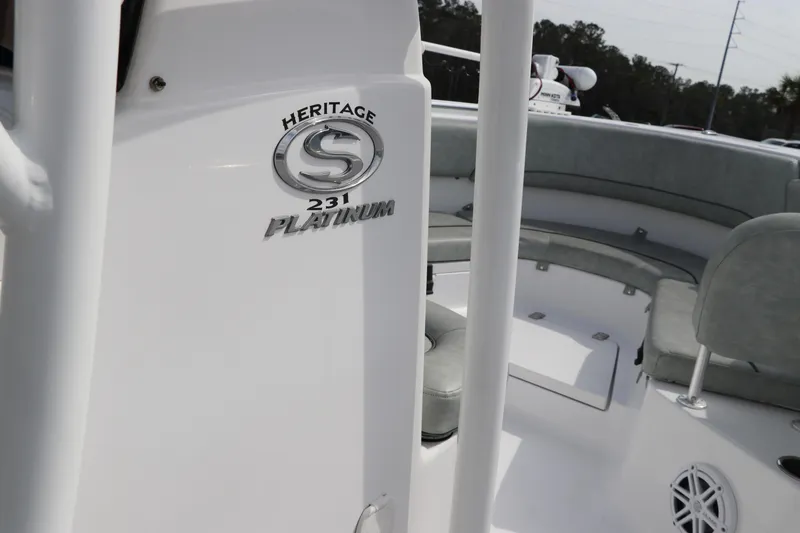 Slide: The Image of 2019 Sportsman Heritage 231 Center Console boat interior with logo detail. - 25