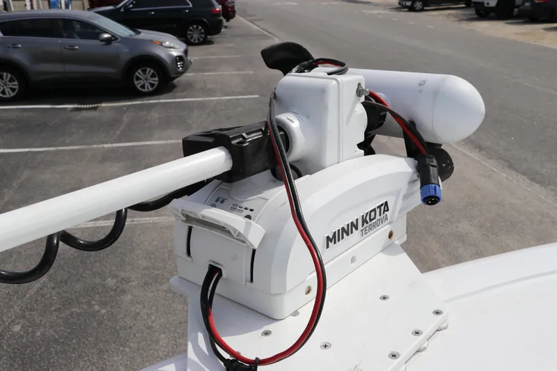 Slide: The Image of Minn Kota trolling motor on 2019 Sportsman Heritage 231 Center Console boat. - 35