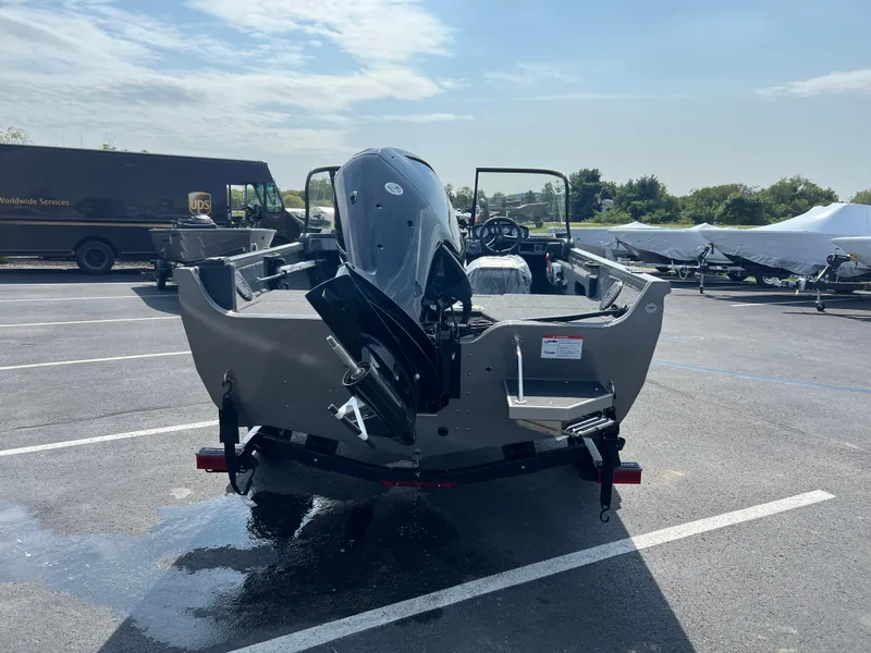 Slide: The Image of 2024 Crestliner 1650 Hawk WT boat in parking lot, rear view. - 3
