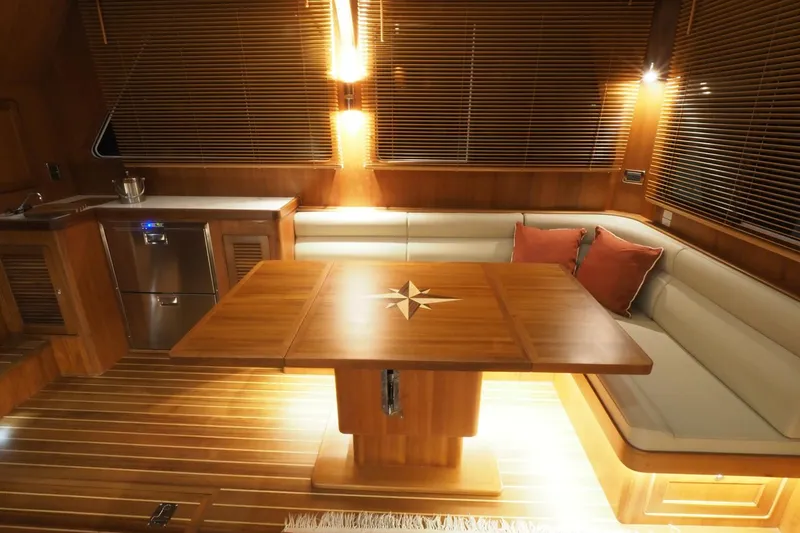 Slide: The Image of Luxurious interior of 2026 Helmsman Trawlers 46 Pilothouse with elegant wood finishes. - 31