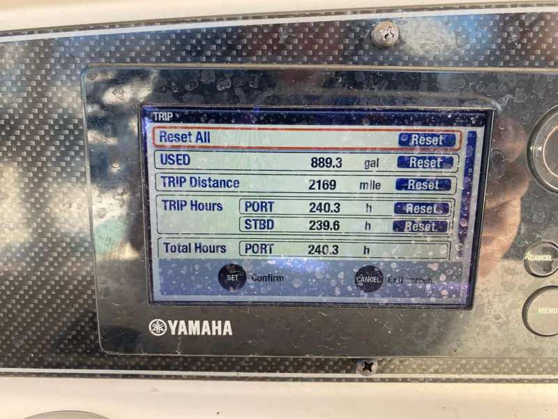 Slide: The Image of Yamaha display showing trip data on a 2015 Grady-White Canyon 306 boat. - 7